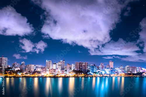 Beautiful Condado Beach, San Juan Puerto Rico seen at night with bay, buildings and lights © littleny
