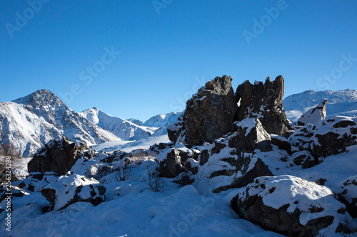 Mountains and the nature of the North Caucasus, the blue sky over high rocks in the beautiful gorge © Ivan_Gatsenko
