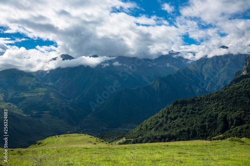 Mountains of the North Caucasus, mountain tops in clouds. Wild nature © Ivan_Gatsenko
