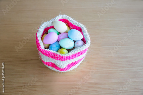 colorful easter eggs in a basket photo