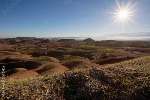 Morocco, Agafay desert against the sun photo