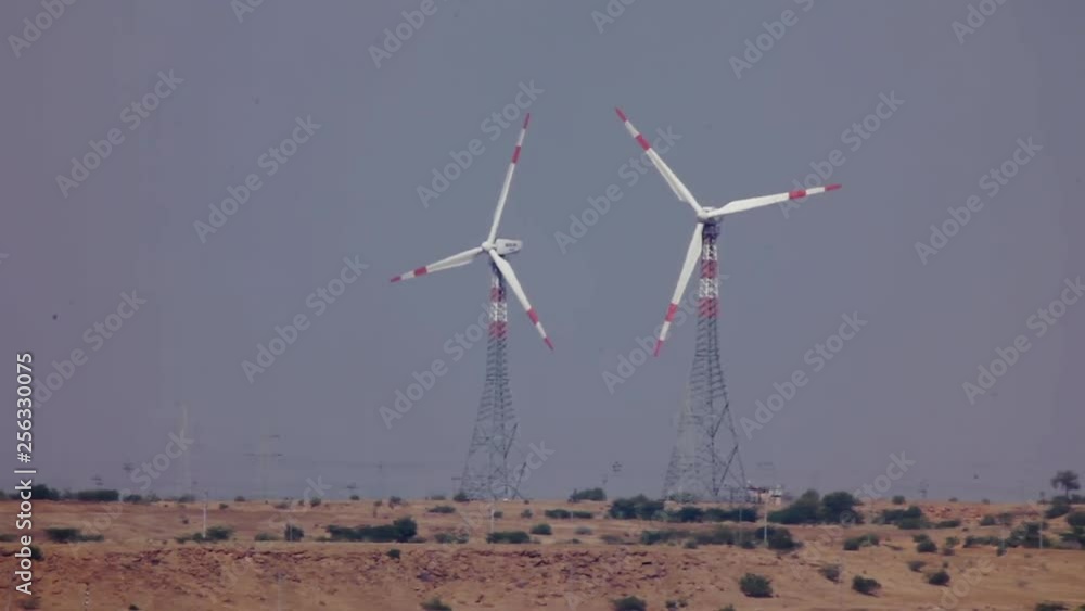 Windmill in the sand desert Windmill in the sand desert