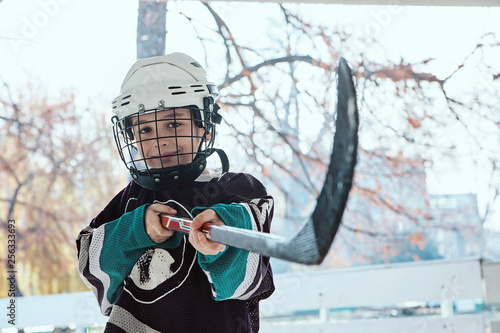 Portrait of a boy in ice hockey gear