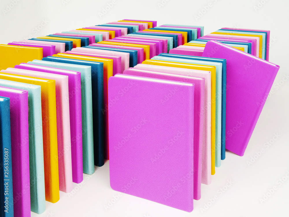 a wide variety of colorful notebooks. a wide variety of colorful notebooks.