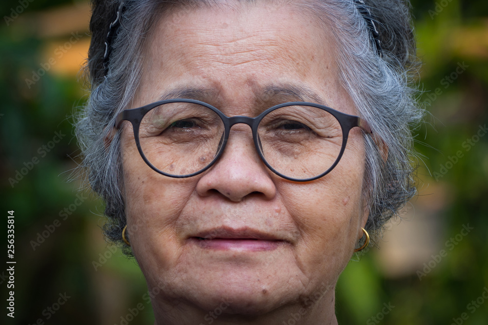 Portrait face of a senior woman. Portrait face of a senior woman.