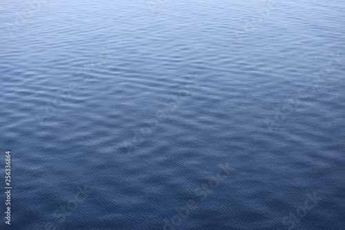 Gradient blue water with ripples background