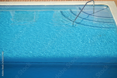 close up on swimming pool with fresh blue water