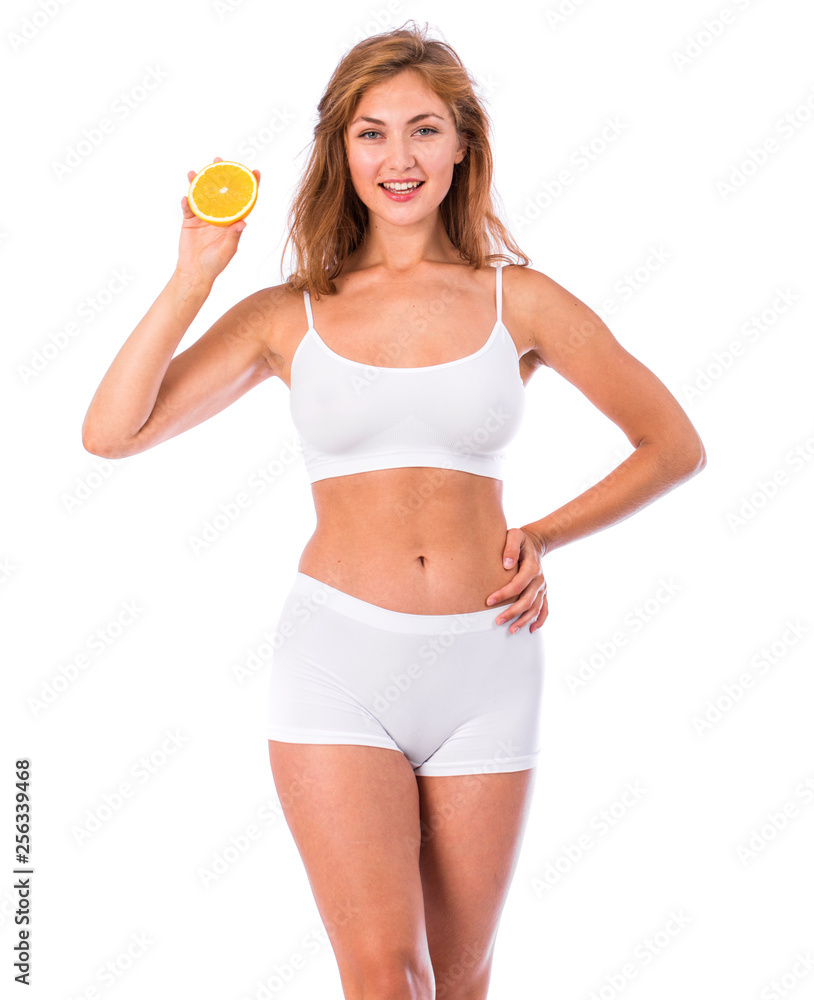 Young beautiful blonde woman in white fitness clothing Young beautiful blonde woman in white fitness clothing