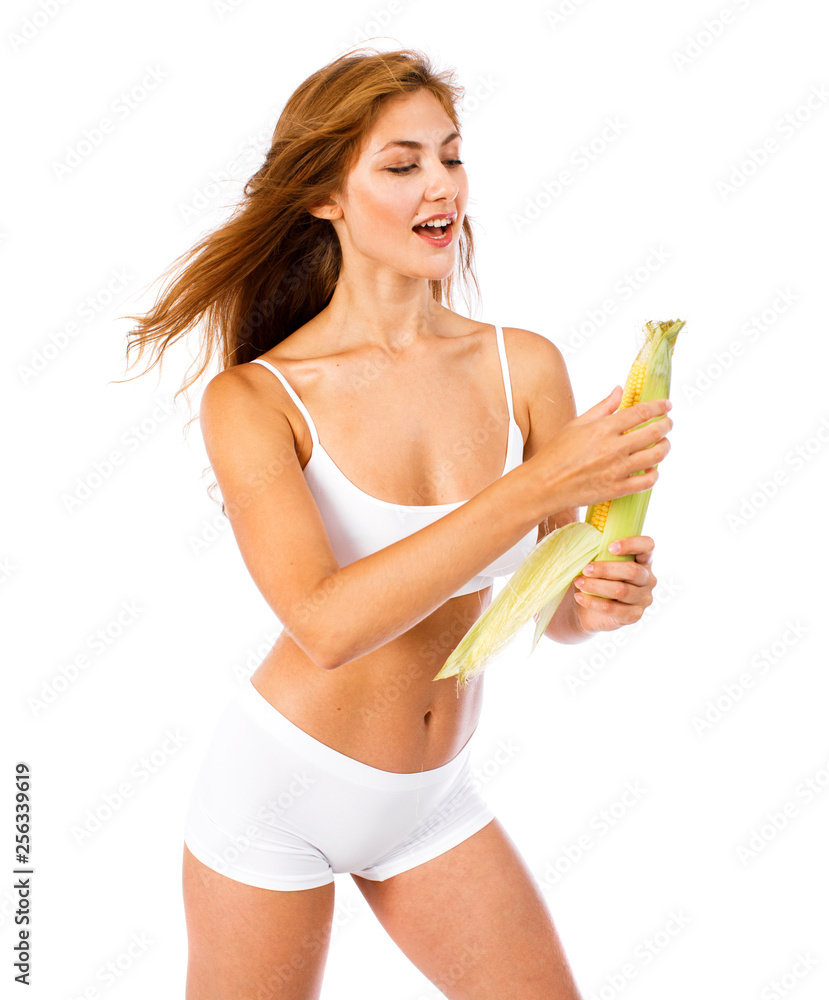 Young beautiful blonde woman in white fitness clothing Young beautiful blonde woman in white fitness clothing
