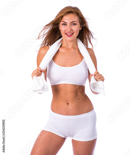 beautiful blonde woman in white fitness clothing