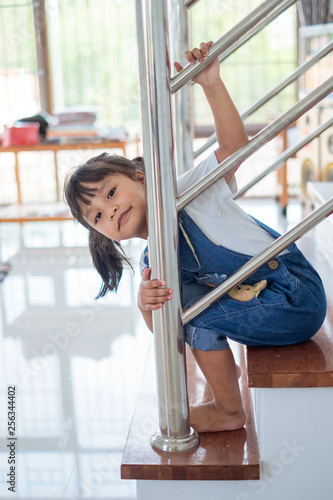 woman sitting on windowsill