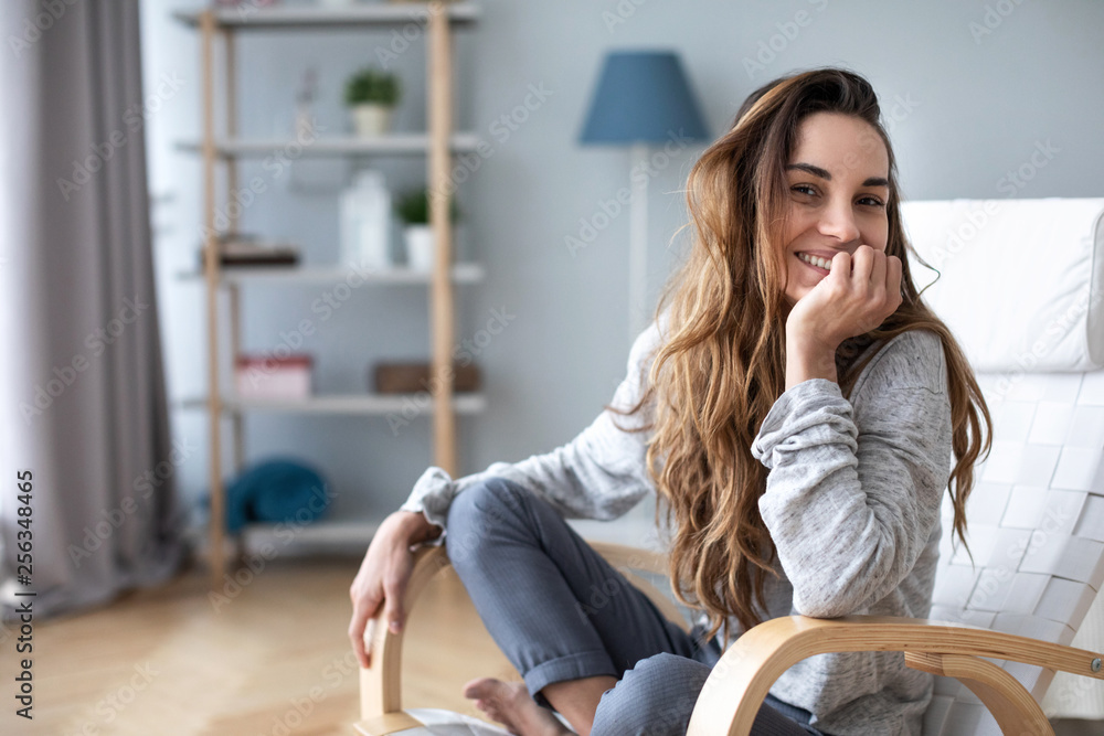 © BestForYou - Portrait of woman smiling at the camera at home. © BestForYou - Portrait of woman smiling at the camera at home.
