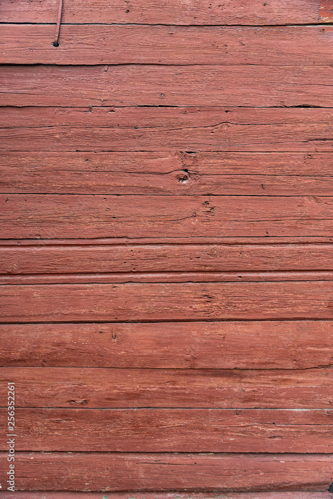 Wooden texture with old peeling paint red Wooden texture with old peeling paint red