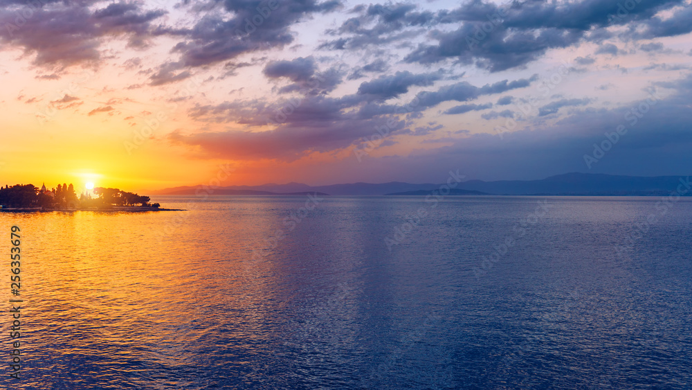 Beautiful sunset or sunrise above the sea. Tropical sunset or sunrise over sea. Colourful sunset or sunrise over water.