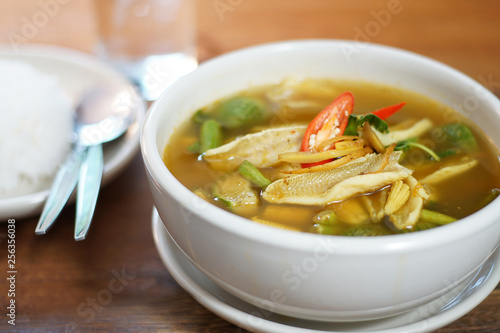 Thai tradition food: Kaeng Pa or Jungle curry is Hot&Spicy Thai curry with fish and spicy herb. Served with steamed rice, Selective focus. Still life shoot in studio, Clean food good taste concept.