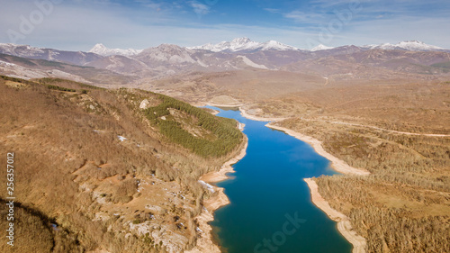 river with snow mountains