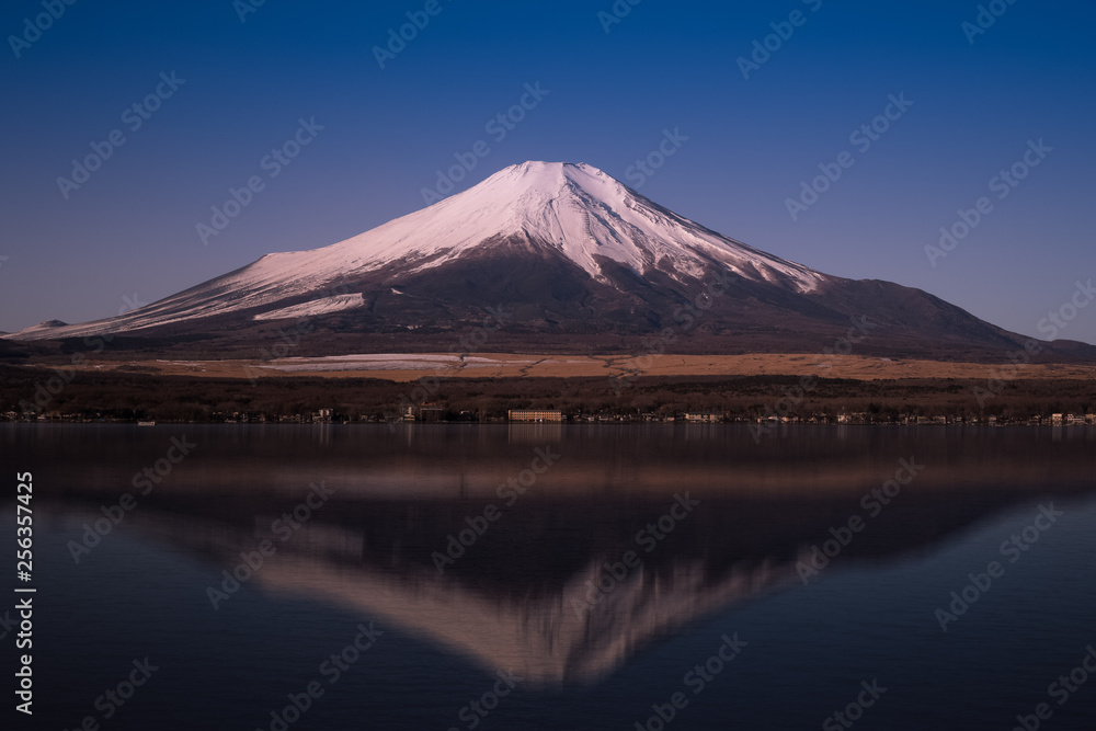 Mt.Fuji and the water reflection at Lake Yamanaka during the winter