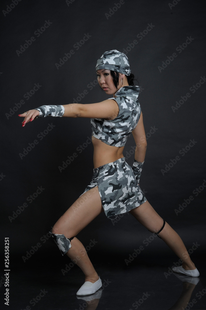 Portrait of stylish woman in military clothes