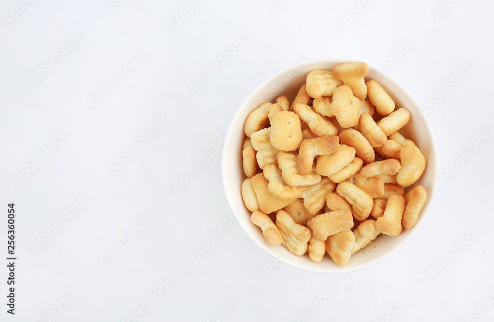 Cracker or Cookie ABC letter alphabet in bowl with copy space on white background. Cracker or Cookie ABC letter alphabet in bowl with copy space on white background.