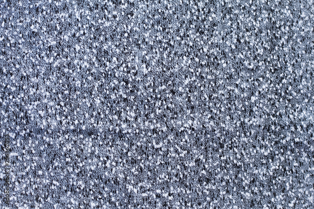 textured background gray knitted fabric top view close-up