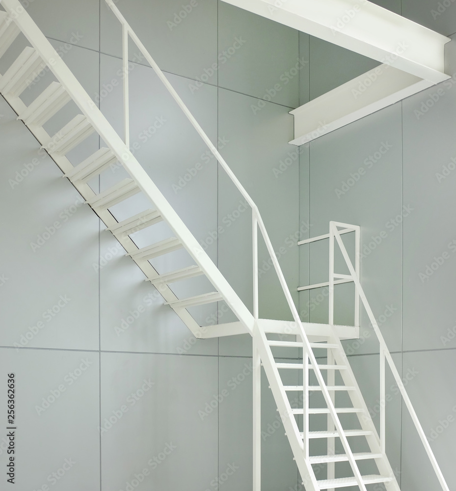 Fototapeta premium Metal stair indoor Emergency Exit in workplace.
