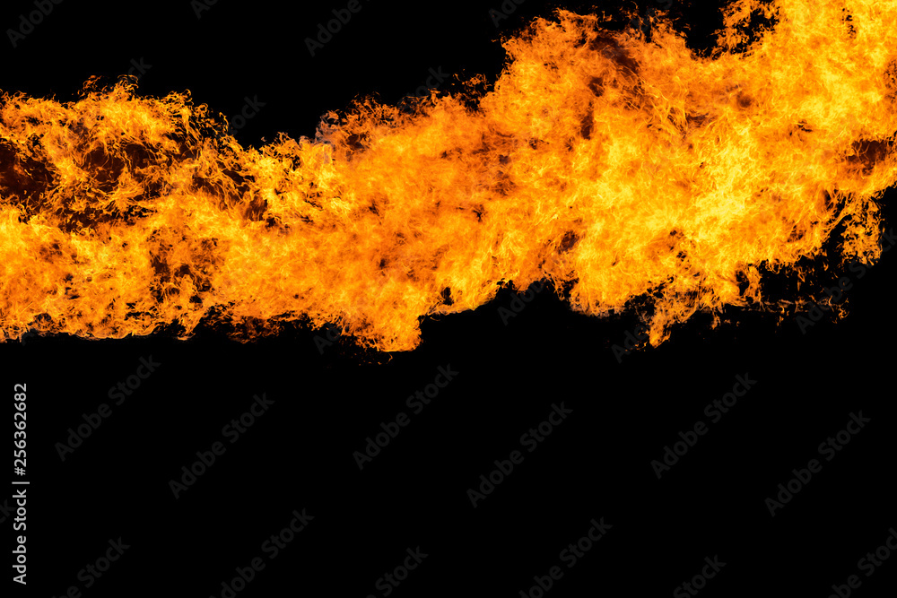 Flames caused by the explosion of the oil isolated on black background. Demonstration of water on oil fire. Flames caused by the explosion of the oil isolated on black background. Demonstration of water on oil fire.
