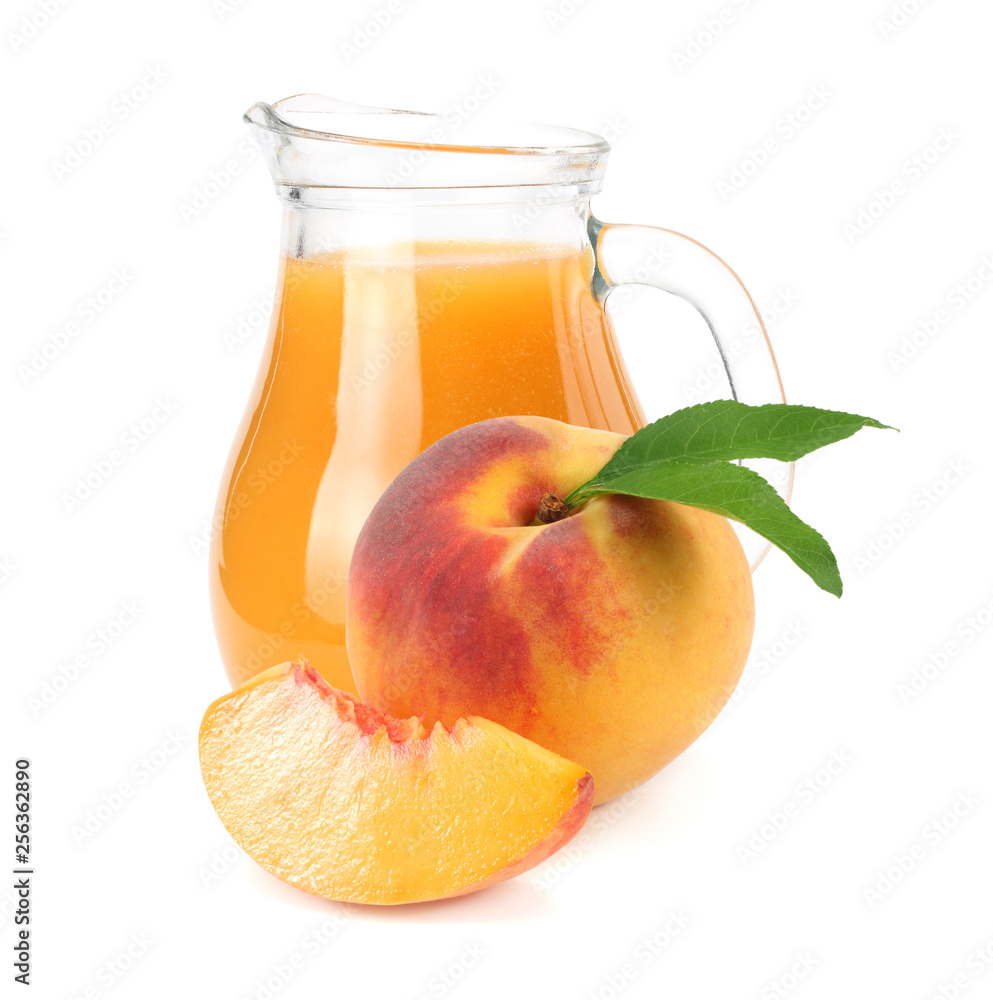 jug of peach juice with peach fruit and slices isolated on white background. jug of peach juice with peach fruit and slices isolated on white background.