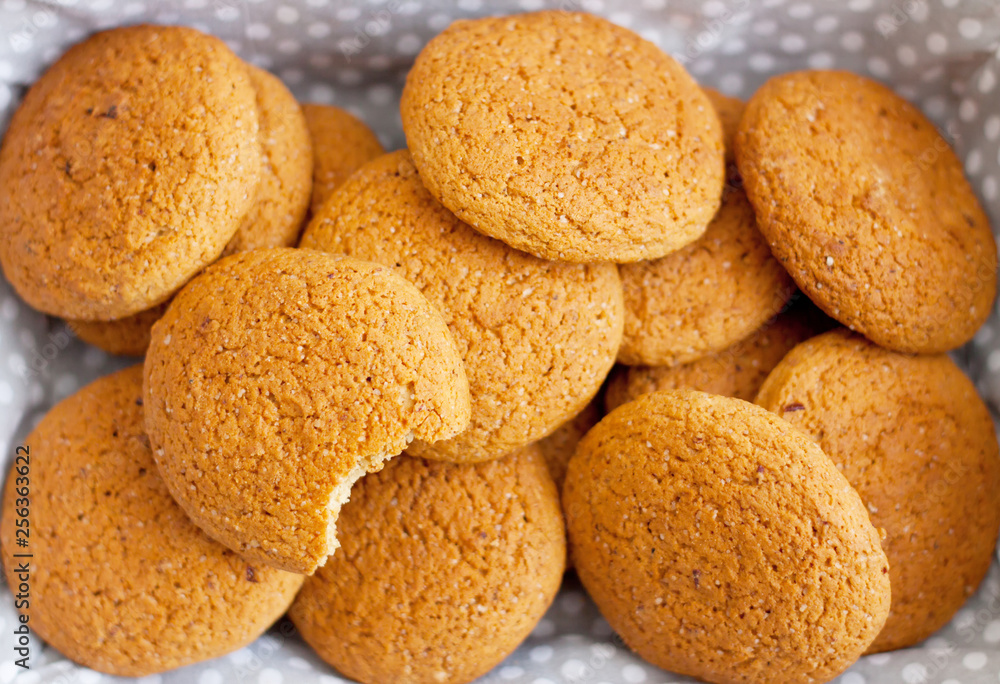 Fresh oatmeal cookies on light-colored fabric Fresh oatmeal cookies on light-colored fabric