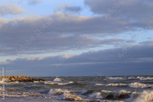 sea with waves against a cloudy sky © Said Ramazanov