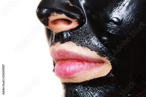 Fotografie Girl black carbo peel off mask on face
