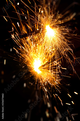 Wallpaper Mural Burning Bengal fire on a black background. Christmas, New Year sparkle fire. Torontodigital.ca