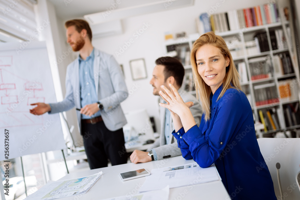 Group of business people working as team in office Group of business people working as team in office