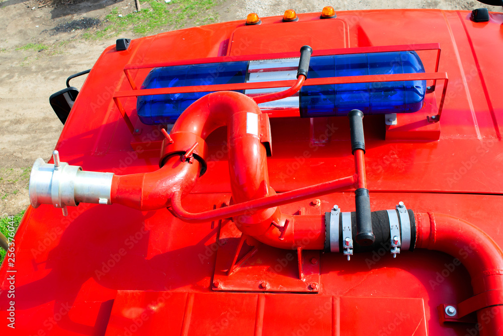 fire monitors and flashers located on the roof of a fire truck