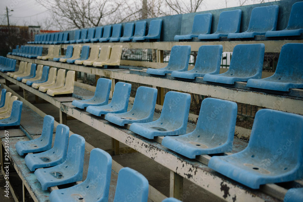 Fototapeta premium Blue plastic seats in the stadium