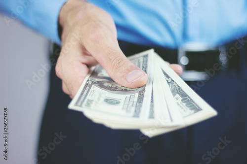  man displaying a spread of cash