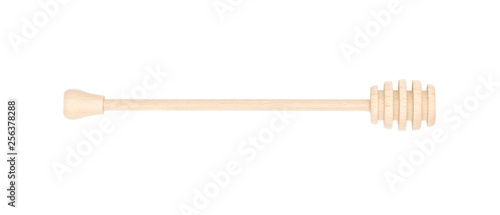Wooden honey dipper isolated on white background photo