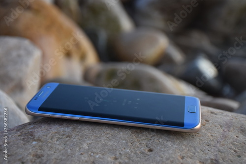Canvas Print s7 edge  mobile in beach near zen stones