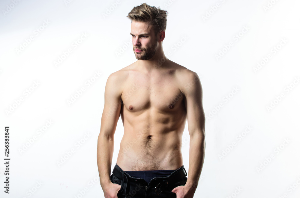 Fitness diet. Desire and temptation. Sexy muscular macho. Six pack of sexy man with bare torso. Male fashion and beauty. Athlete man, hair care. Muscular trainer after sport workout isolated on white Fitness diet. Desire and temptation. Sexy muscular macho. Six pack of sexy man with bare torso. Male fashion and beauty. Athlete man, hair care. Muscular trainer after sport workout isolated on white