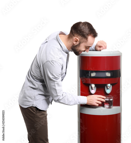 Man pouring water from cool...