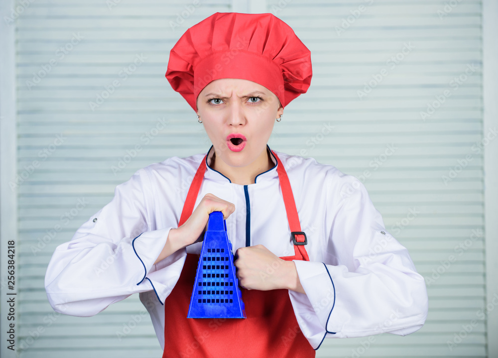 Kitchen utensils. culinary cuisine. girl in apron and hat. cook in  restaurant, uniform. professional chef cooking in kitchen. angry woman  loves cooking food with grater. Need some help Stock Photo | Adobe