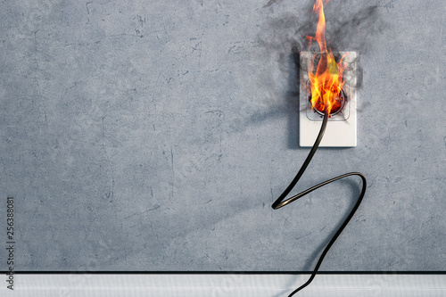 fire and smoke on electric wire plug in indoor, electric short circuit causing fire on plug socket