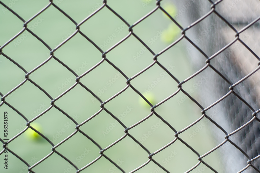 Fototapeta premium chain link fence with barbed wire