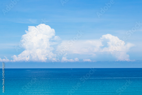 Perfect blue sky with clouds and water of ocean in the morning.