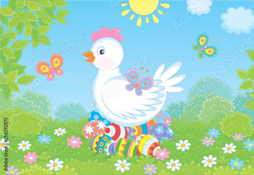 Cute white hen sitting on colored Easter eggs on green grass among flowers and flittering butterflies on a sunny spring day, vector illustration in a cartoon style