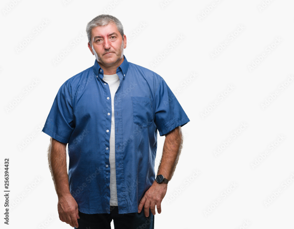 Handsome senior man over isolated background skeptic and nervous, frowning upset because of problem. Negative person. Handsome senior man over isolated background skeptic and nervous, frowning upset because of problem. Negative person.