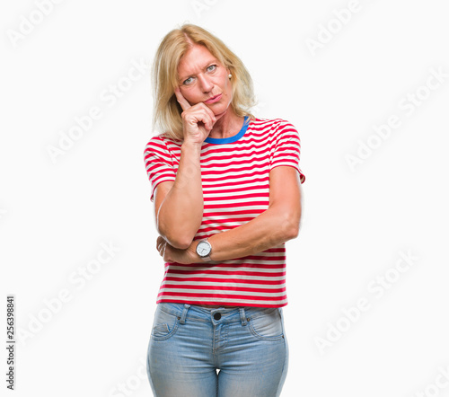 Middle age blonde woman over isolated background thinking looking tired and bored with depression problems with crossed arms.