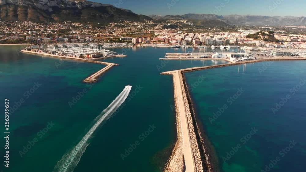 Aerial view of Denia port. The city and Montgo mountain in the background. Aerial view of Denia port. The city and Montgo mountain in the background.
