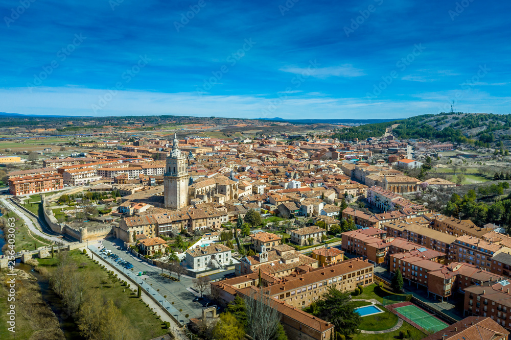 El Burgo de Osma medieval castle and town aerial view in Castille and Leon Spain with blue sky on a sunny day