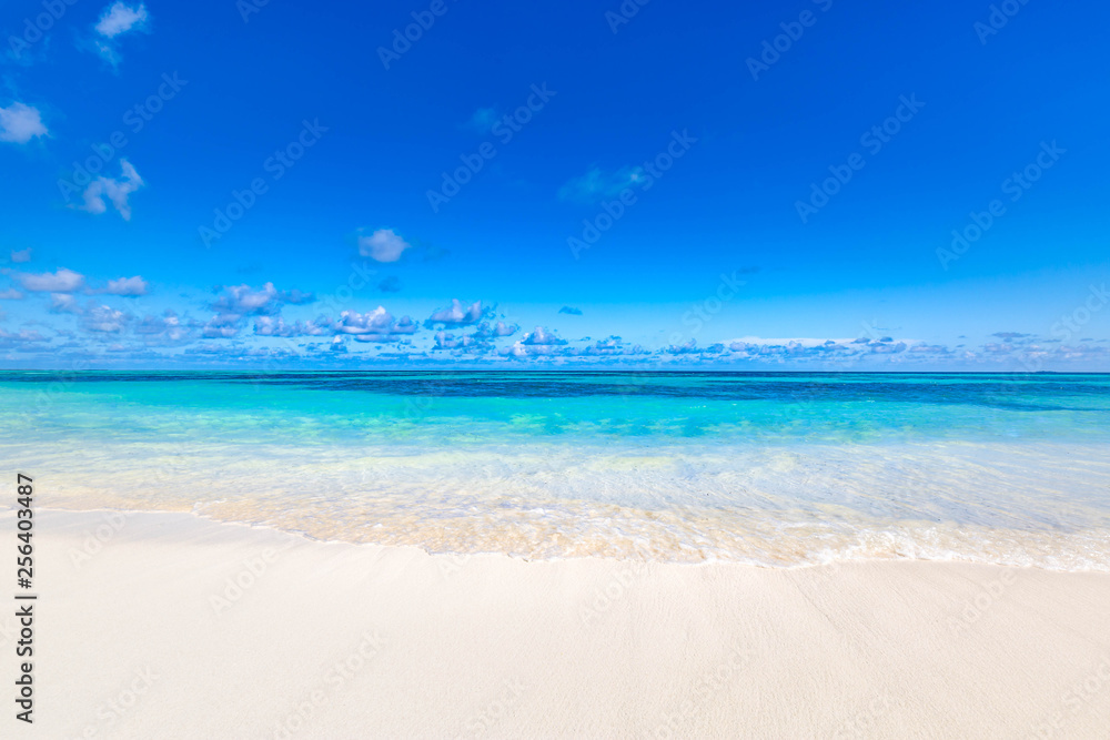 Sea view from tropical beach with sunny sky. Relaxing beach landscape