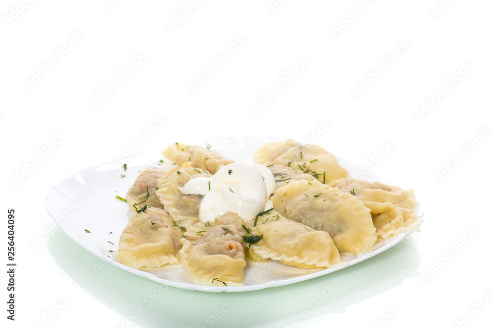 Dumplings boiled with stuffing on a white background Dumplings boiled with stuffing on a white background